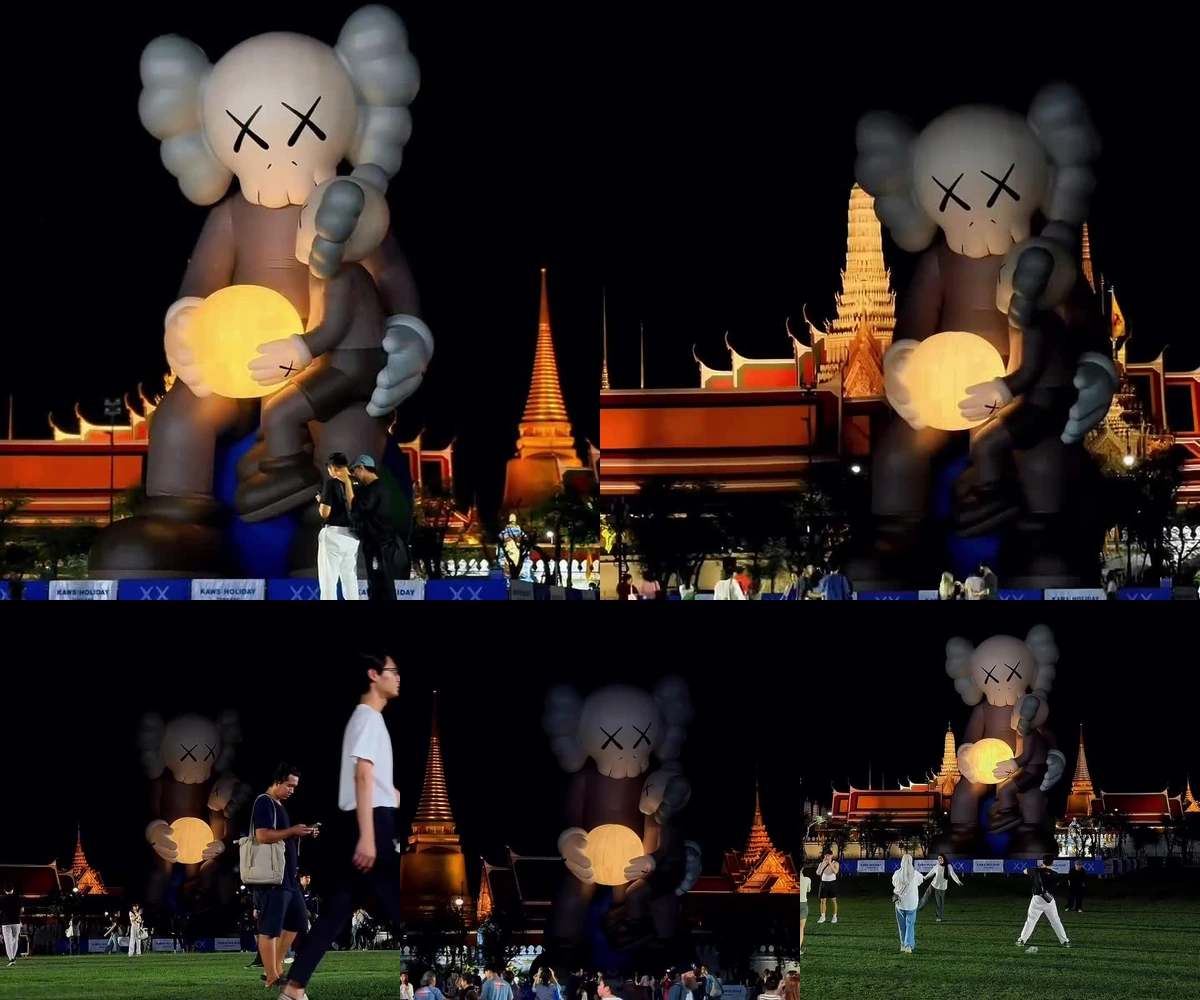 ภาพรีวิว KAWS:HOLIDAY THAILAND • ยามค่ำ — บรรยากาศงานศิลปะกลางสนามหลวงในแสงไฟยามค่ำ