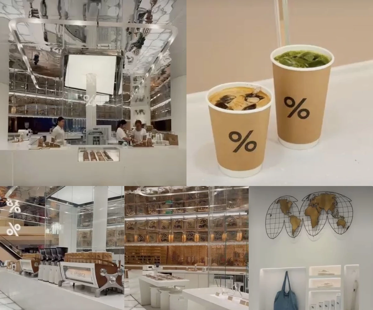 ภาพรีวิว % Arabica • ไอคอนสยาม — คาเฟ่โทนขาวกับเพดานสะท้อนในไอคอนสยาม